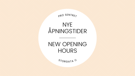 A white picture with a beige background. White circle with black text inside "Pro sentret Nye åpningstider new opening hours Storgata 11